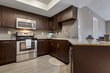 Stainless steel appliances with glass top stove